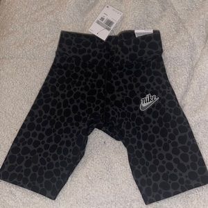 Nike women’s tight fit mid rise shorts